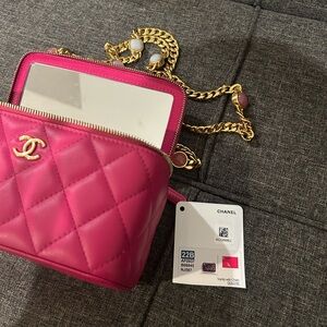 Fuchsia chanel vanity with charms and gold hardware